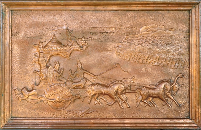 Copper repousse panel depicting Krishna as the chariot driver of Arjuna in the Battle of Kurukshetra