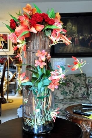 Silk floral arrangement of flowers and orchids