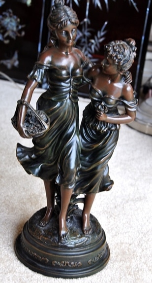 Replica sculpture of Two Sisters by Auguste Moreau
