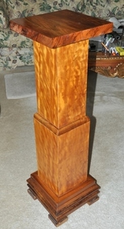 Antique wooden pedestal with square crosss section