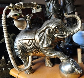 Vintage French style telephone with brass elephant sculpture