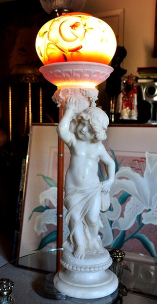 Unique table lamp with marble sculpture of a child carrying a basket of grapes