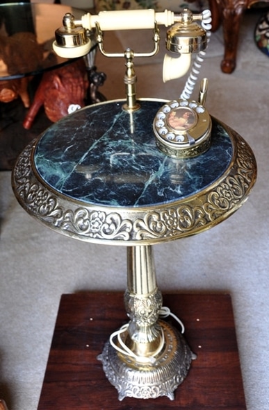 French style telephone on green marble top brass table