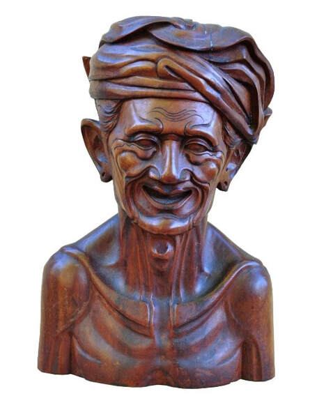 Balinese hardwood bust sculpture of a grinning old man