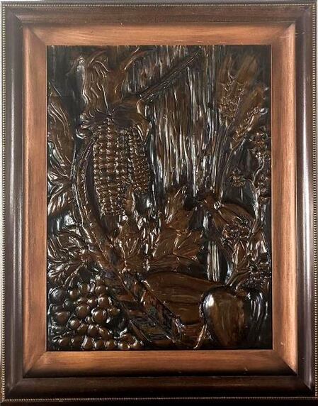 Large framed copper embossed art depicting fruits and vegetables