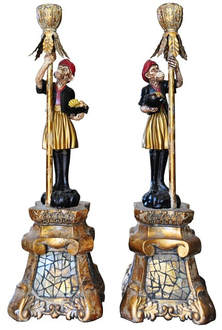 Pair of ornate candlesticks with figural blackamoor monkeys