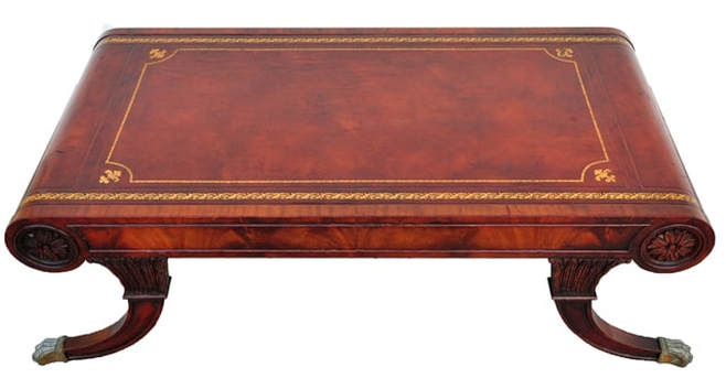 Weiman Heirloom Regency style flame mahogany scroll shaped coffee table with tooled leather top and lion claw feet