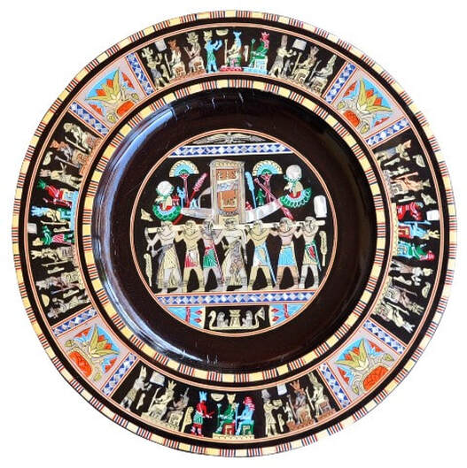 Egyptian inlaid wooden charger depicting ancient art subjects