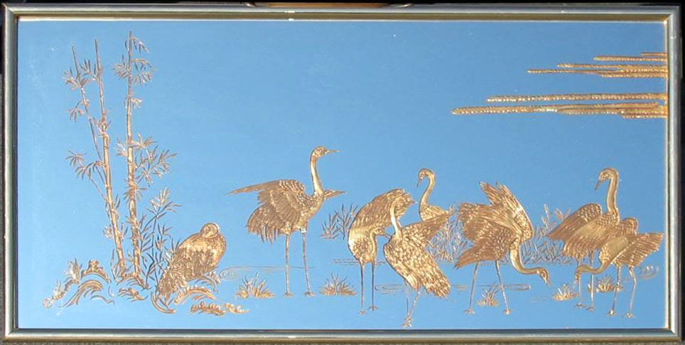 Mid-century Hollywood Regency mirror etched with scenery of cranes in an open wetland habitat