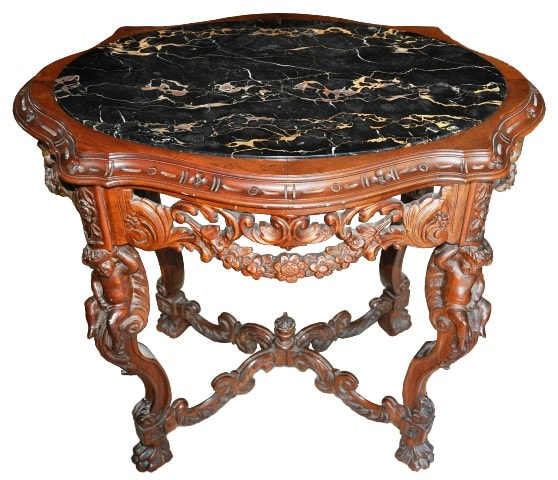 Victorian walnut center table with carved full cherubs and inset Portoro marble