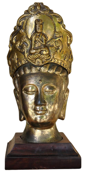 Vintage brass Buddha head sculpture on wooden base